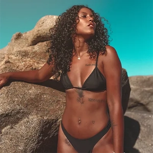 Waxing treatment guest in bathing suit