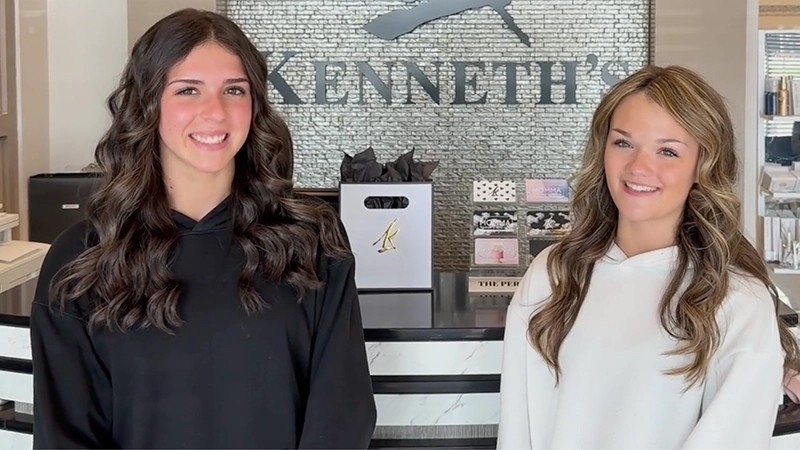 Image of two happy clients