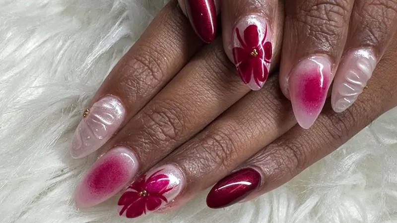 Image of well-done and healthy nails with art and polish